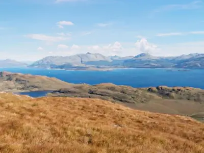 a view of a large body of water with mountains at Shepherds Cabin - Uk48225 in Ardgour