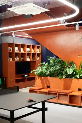 an office with a table and some plants at The Social Hub Glasgow Extended Stay in Glasgow