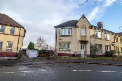 a house on the side of a street at Kerr Apartment-Spacious 4-Bed Flat in Hamilton, Close to Glasgow in Cadzow