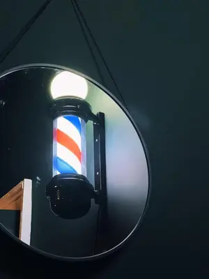 a rear view mirror with a red white and blue light at Central Designer Flat by Castle in Edinburgh