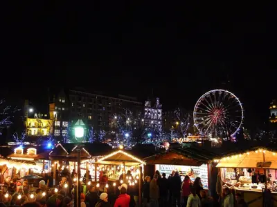 a crowd of people at a christmas market at night at Modern 2 bedroom apartment in City Centre in Edinburgh
