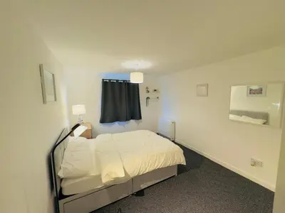 a bedroom with a bed in a room at Cosy flat in Glasgow in Maryhill