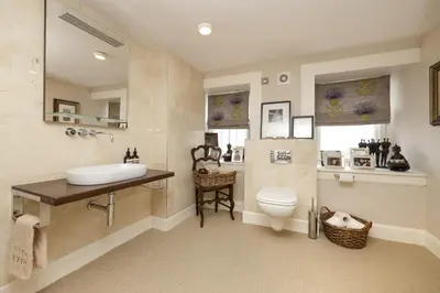 a bathroom with a sink and a toilet at Prestigious Townhouse close to Princes Street in Edinburgh