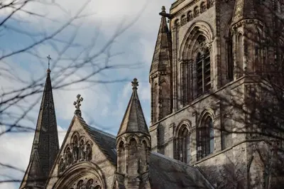a large church with steeples on the side of it at Prestigious Townhouse close to Princes Street in Edinburgh