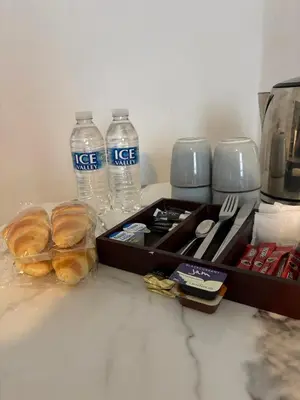 a box of water and some bread and water bottles at Piccolo in Glasgow