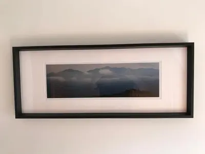 a picture frame hanging on a wall at STYLISH APARTMENT with PRIVATE ROOF TERRACE in Edinburgh