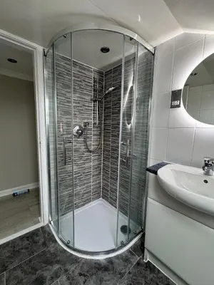 a bathroom with a shower and a sink at Caplawhead in Armadale
