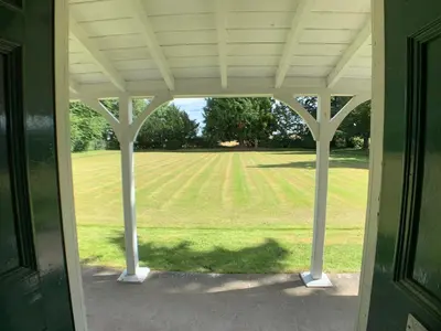 an open porch with a view of a field at Couples Unique Stay in Bowling Club newly upgraded in Forteviot