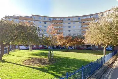 a park in front of a large building at Top Floor Getaway with Cozy Canopy Bed in Edinburgh