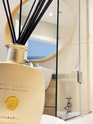 a glass display case with a gold medal on it at Top Floor Getaway with Cozy Canopy Bed in Edinburgh