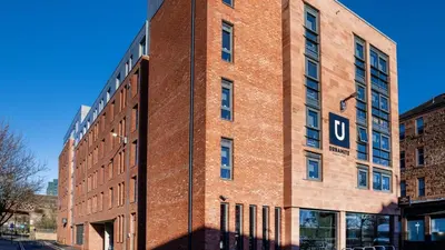 a brick building with a sign on the side of it at For Students Only Clyde Court Glasgow in Glasgow