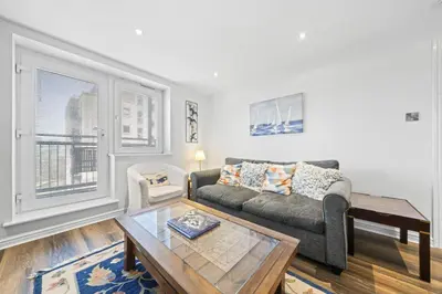 a living room with a couch and a coffee table at Slateford 2 Bedroom Apartment - Edinburgh in Edinburgh