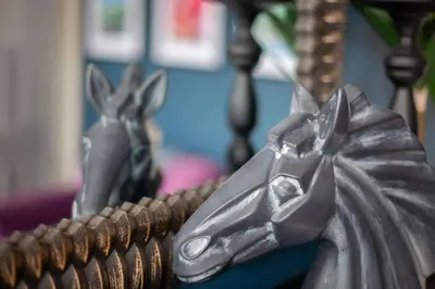 a close up of a horse in a mirror at Newly Renovated Flat in Trendy Finnieston in Glasgow