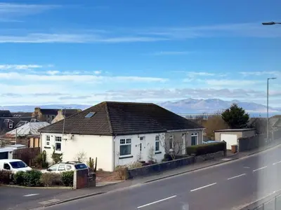 a house on the side of a road at The Bruadair - Modern Town Living in Ardrossan