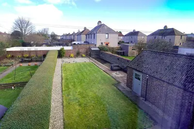 an aerial view of a yard with houses at The Bruadair - Modern Town Living in Ardrossan