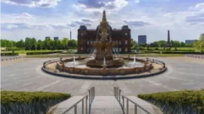 a large fountain in front of a building at 2 Bed on the Glasgow Green in Glasgow