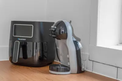 a coffee maker sitting on top of a counter at Arran Cottage - 4 Bed Home on M8 in Coatbridge