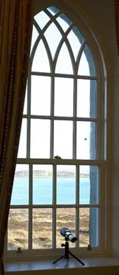 a large window with a camera in front of it at Leargy House in Isle of Jura