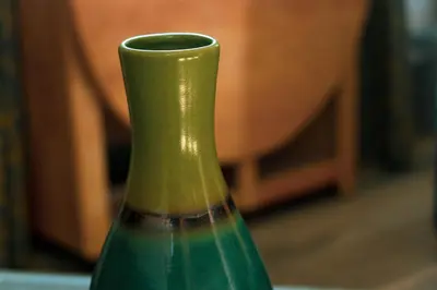 a green vase sitting on top of a table at The Snook-Free Parking-Near Pentland Hills in Loanhead