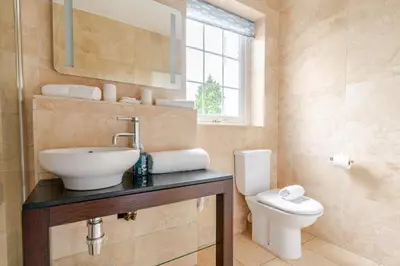 a bathroom with a sink and a toilet at Amulree, Edinburgh City in EDI
