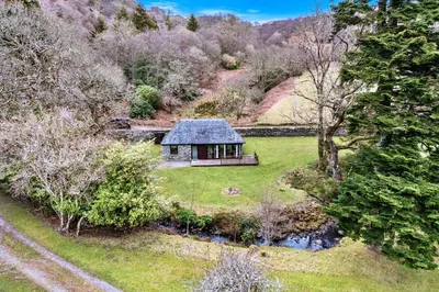 an aerial view of a small house in a garden at Finest Retreats - The Turbine House in Achahoish