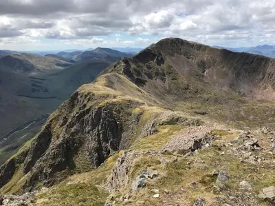 a view from the top of a mountain at Squirrels Wood Lodge, nr Glencoe, dog friendly in Acharra
