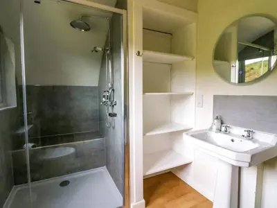 a bathroom with a shower and a sink at Creags in Oban