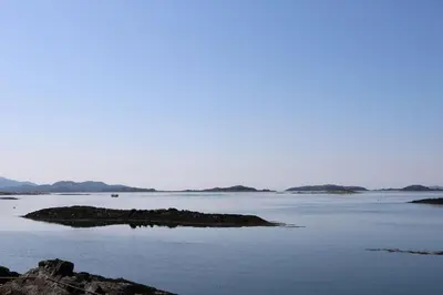 an island in the middle of a large body of water at Creags in Oban