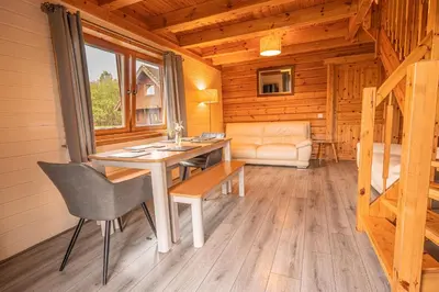 an office with a desk and a chair in a cabin at Lodge 1 in Stirling
