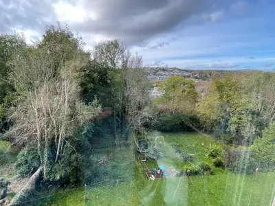 an aerial view of a field with trees at Isle of Bute Blissful Retreat- Stunning 3 Bed Flat in Rothesay