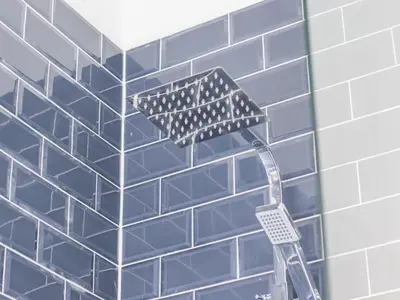 a shower head in a bathroom with blue tiles at Pass the Keys Victoria Road Queens Park View in Glasgow