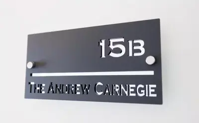a sign that reads the anniversary cancer at Stylish 2-Bed Apartment in the Heritage Quarter in Dunfermline