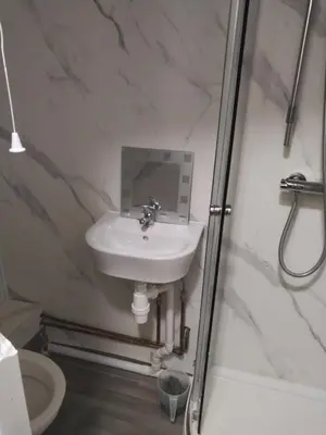 a bathroom with a sink and a shower at 98 Board street in Moffat
