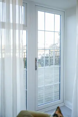 an open door with a view of a balcony at Stirling Townhouse Apartment Btm in Stirling