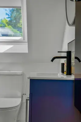 a kitchen with a sink and a window at Edinburgh's Springtime Chalet in Roslin