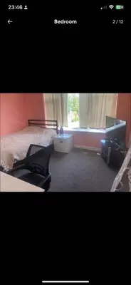 a bedroom with a bed and a window at Coven in Moffat