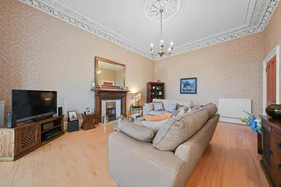 a living room with a couch and a television at Merchiston 1 Room in Shared Apartment with Parking - Edinburgh in Edinburgh