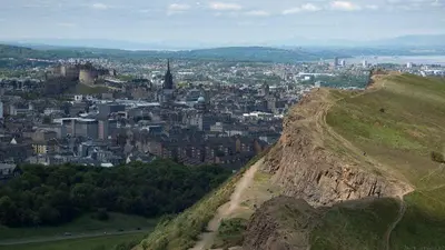a view of a city from the top of a hill at Edinburgh Central Morrison Apartment in Edinburgh