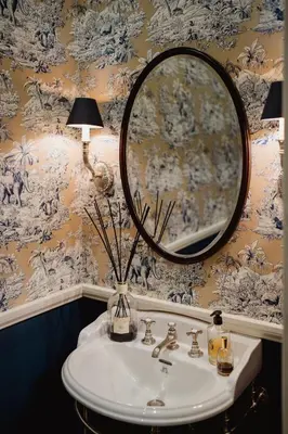 a bathroom with a sink and a mirror at Private and Prestigious Luxury Home in Edinburgh