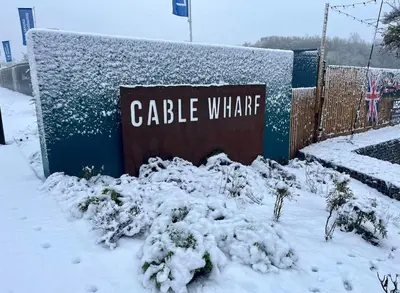 a sign that reads cable wildlife in the snow at Middle Kent Lux! in Moffat