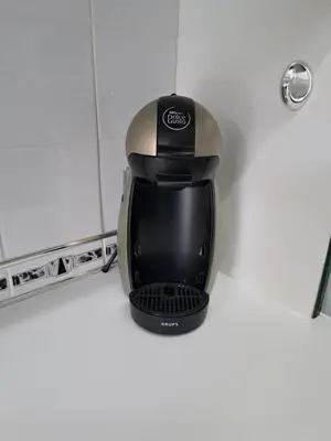 a coffee maker sitting on a counter in a bathroom at Historic central apartment in Castlehill Mansions in Campbeltown