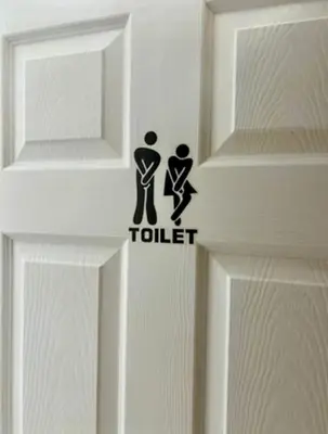 a door with a toilet sign on it at HULL 2BED Sleeps 4 BETTO Cosy Home! in Moffat