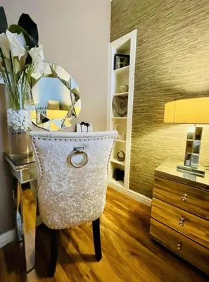 a room with a desk with a chair and a mirror at Isle Be Back-Ground Floor Flat in Millport