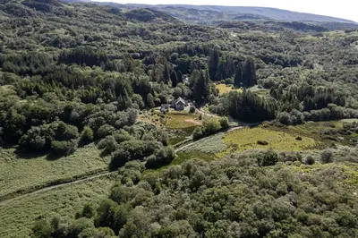 an aerial view of a house in a forest at Dalnahua on 'The Secret Coast'