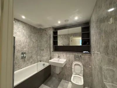a bathroom with a sink and a toilet and a bath tub at victoria resedent in Moffat