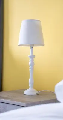 a white lamp sitting on a table at 3 BDR House By Caledonia Luxe Stays Short Lets & Serviced Accommodation Broxburn in Broxburn