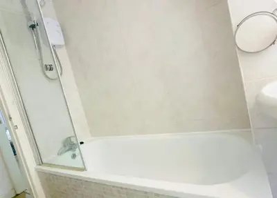 a bathroom with a shower and a sink at Private Room in Glasgow City in Hillfoot