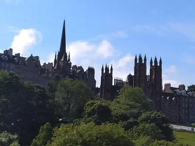 an old building with a spire on top at Comfortable room with en suite in Edinburgh