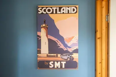 a sign hanging on a wall with a lighthouse at Argyll Farmhouse-Idyllic Setting-Sleeps10 in Dunoon