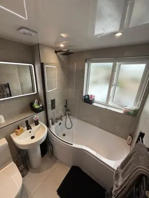 a bathroom with a tub and a sink at Best stay in the bay in Saint Davids